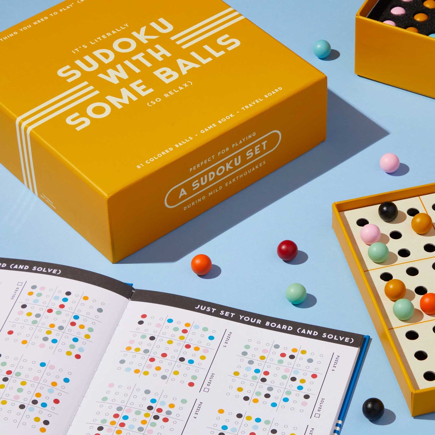Sudoku game set with contents of the game displayed outside the box