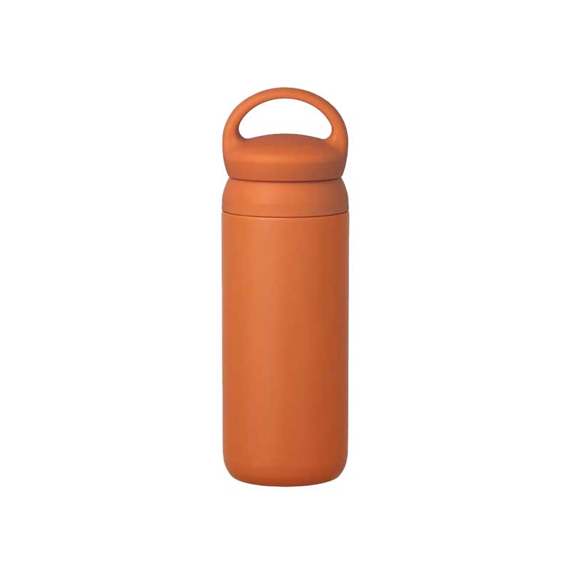 Insulated, stainless steel travel tumbler with a rounded handle for easy carrying