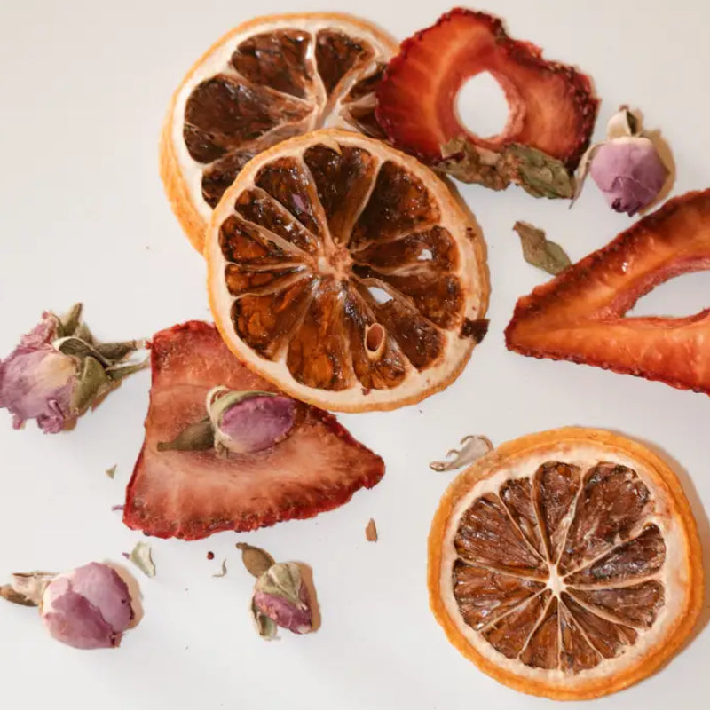 blend of dried oranges, roses, and strawberries to be used as a drink garnish