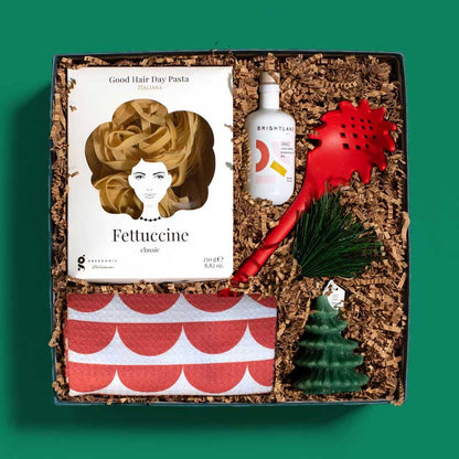 Food-themed holiday gift box with handmade pasta, gourmet olive oil, a pasta spoon and more