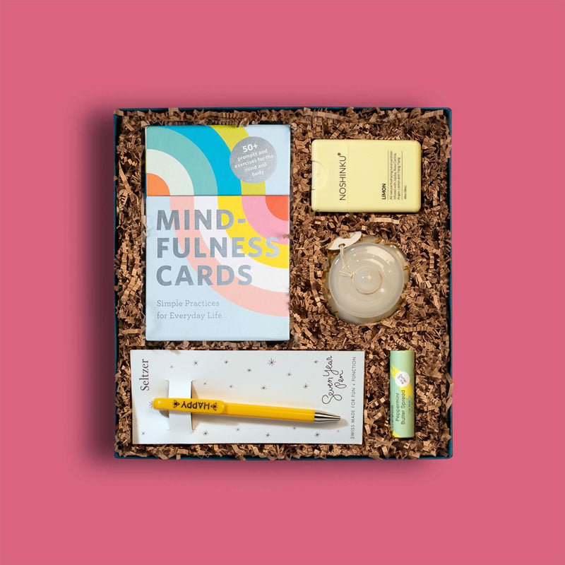 Unique onboarding gift box with mindfulness cards, lip balm, hand sanitizer and more